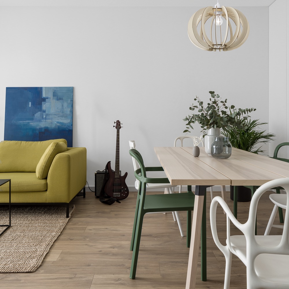 Eclectic,Style,Living,Room,With,Yellow,Couch,,Art,,Wooden,Floor